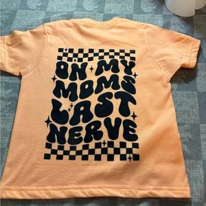 This is a kids shirt. Can do in a different color, long sleeve or sweatshirt.